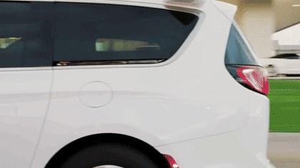 A video of a white, self-driving Waymo Pacifica in Phoenix