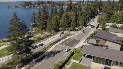 To bring the benefits of our technology to more people in more places and deliver on our mission to improve road safety, we take the Waymo Driver on road trips to regions where the driving culture and conditions differ from the areas we regularly operate. The graphic illustrates the a Waymo vehicle driving on a 'road trip' in Bellevue, Washington and fully-autonomously driving in the rain in San Francisco, California. 