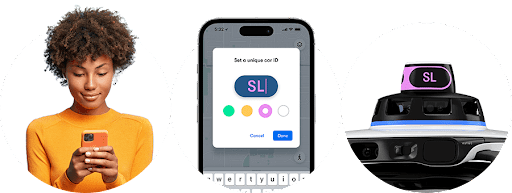 三张连续的图片，第一张显示一位女士在查看手机，第二张显示应用屏幕上选择的要在车辆上显示的字母，第三张显示选定的字母出现在自动驾驶汽车车顶显示屏上。